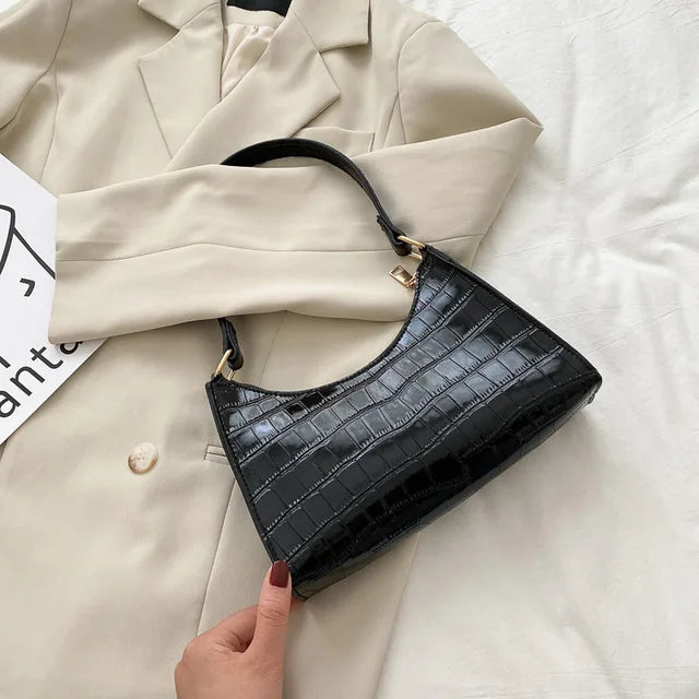 Tilly™ | Lesklá kabelka přes rameno s aligátorovým vzorem" can be rewritten as:
"Tilly™ | Elegantní lesklá kabelka přes rameno s aligátorovým designem