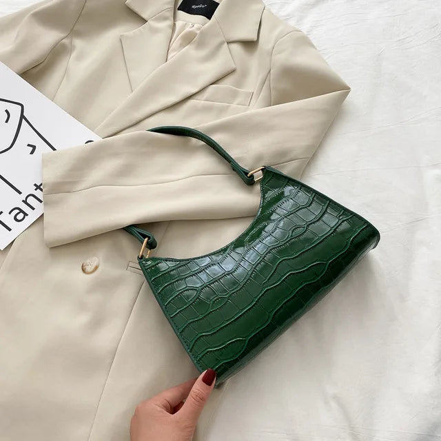 Tilly™ | Lesklá kabelka přes rameno s aligátorovým vzorem" can be rewritten as:
"Tilly™ | Elegantní lesklá kabelka přes rameno s aligátorovým designem