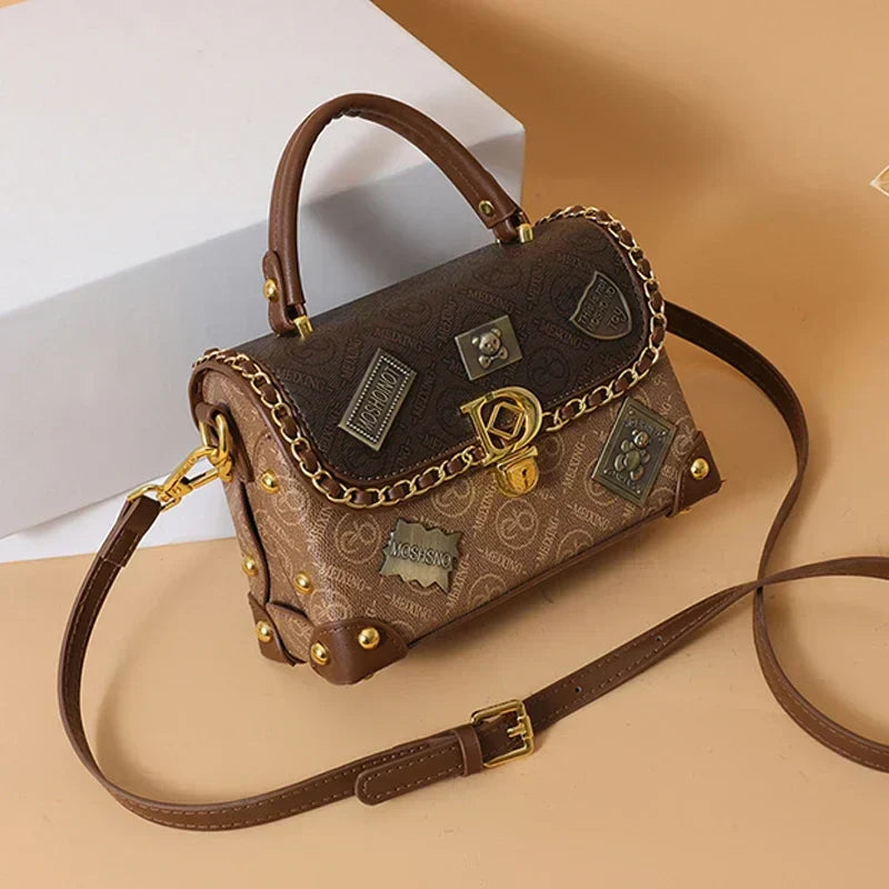 Zelda™ Vintage Crossbody Bag with Monogram and Gold Accents