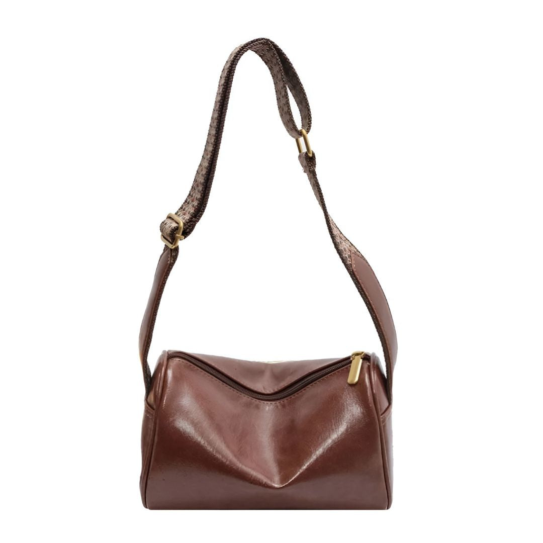 Trine™ | Vintage Kožená Crossbody Taška s Woven Nastavitelným Popruhem" 

Rewritten: "Trine™ | Vintage Leather Crossbody Bag with Woven Adjustable Strap