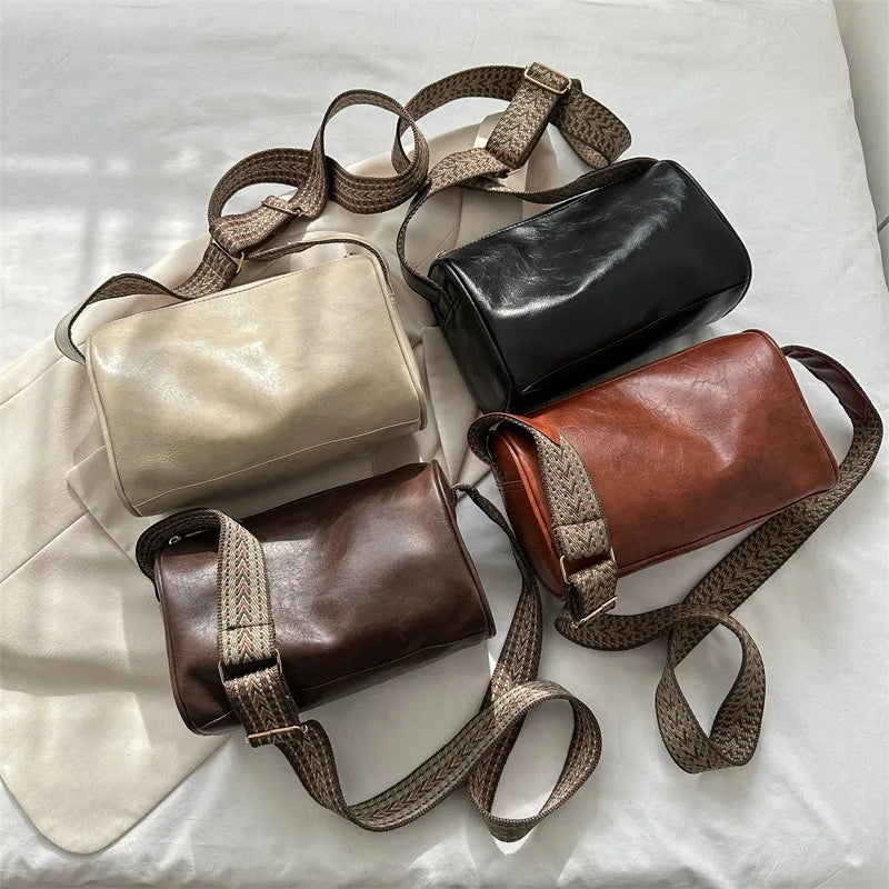 Trine™ | Vintage Kožená Crossbody Taška s Woven Nastavitelným Popruhem" 

Rewritten: "Trine™ | Vintage Leather Crossbody Bag with Woven Adjustable Strap